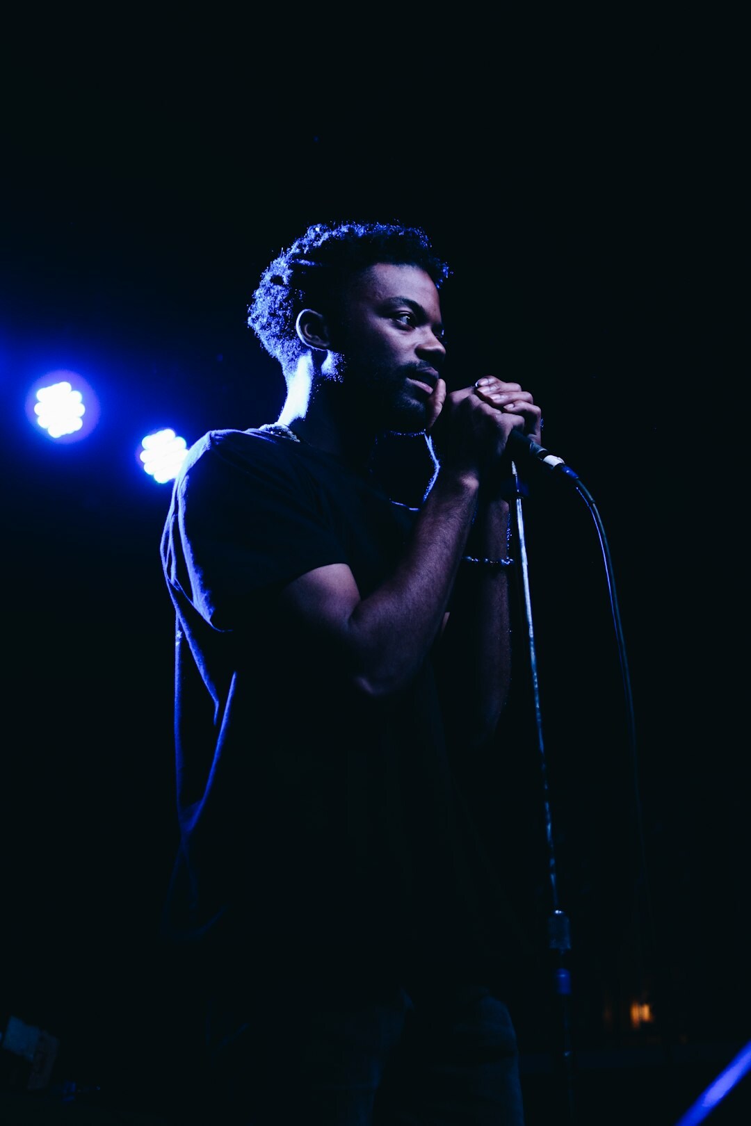 singer performing on stage